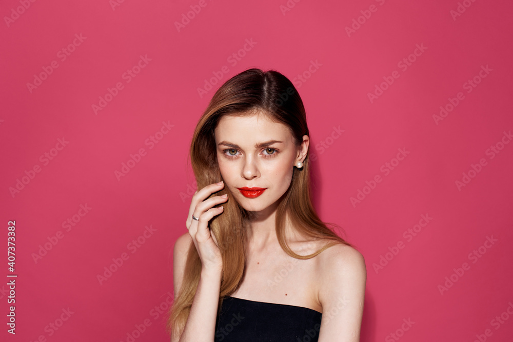 Woman in black dress red lips glamor pink background glamor Woman in black dress red lips glamor pink background glamor