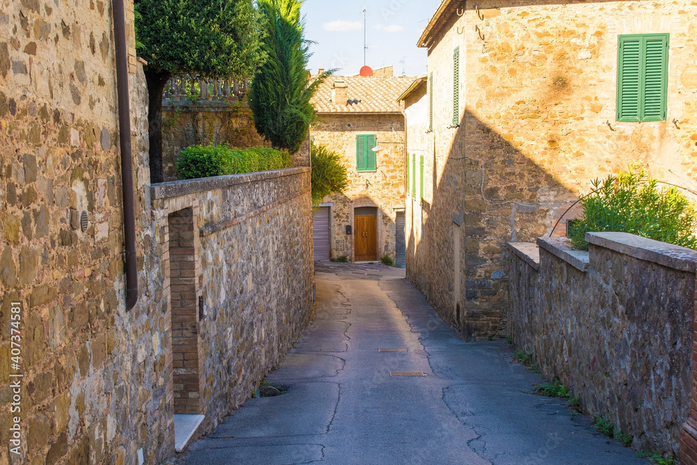 A quiet residential street in the historic medieval village of Montalcino in Siena  province, Tuscany, Italy
