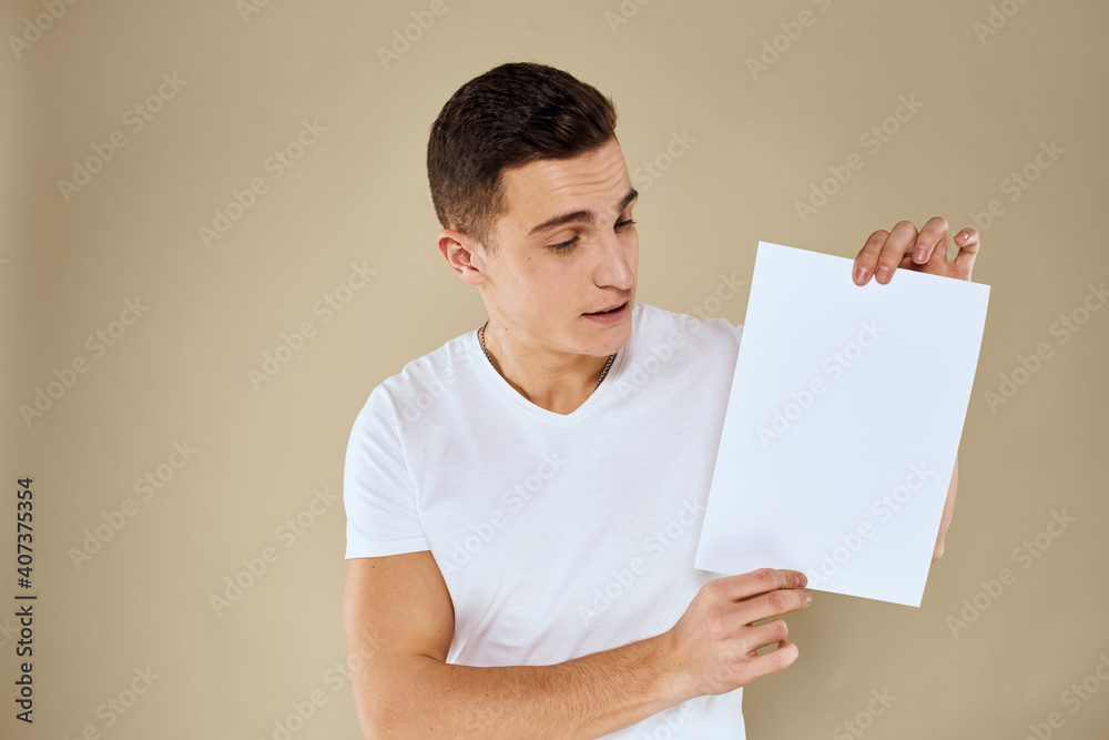 man holding white sheet of paper in hand billboard copy space office man holding white sheet of paper in hand billboard copy space office