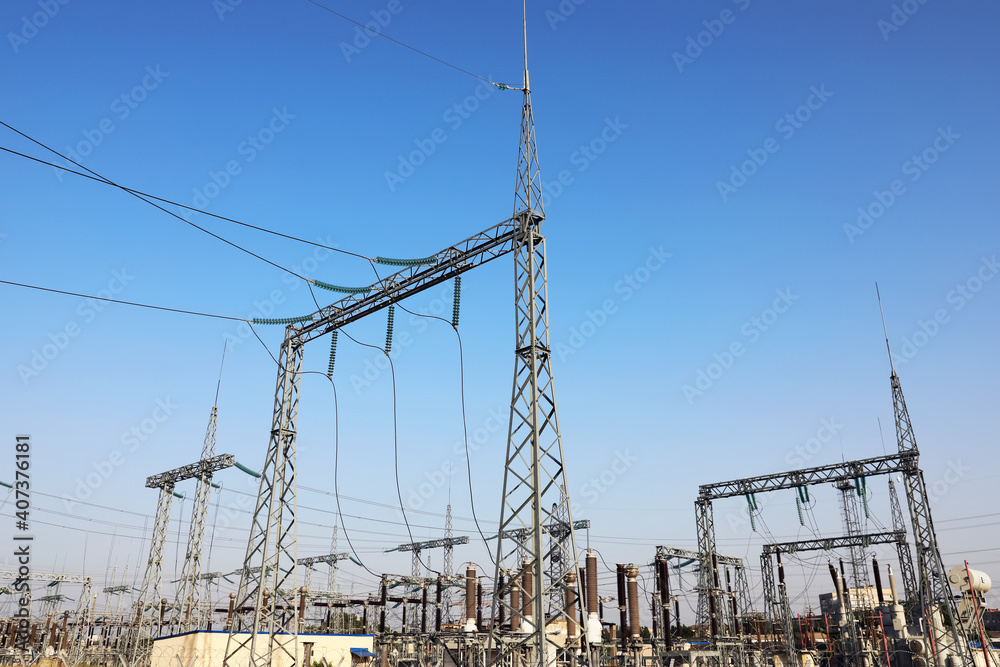 Modern electrical substation on sunny day, low angle view Modern electrical substation on sunny day, low angle view