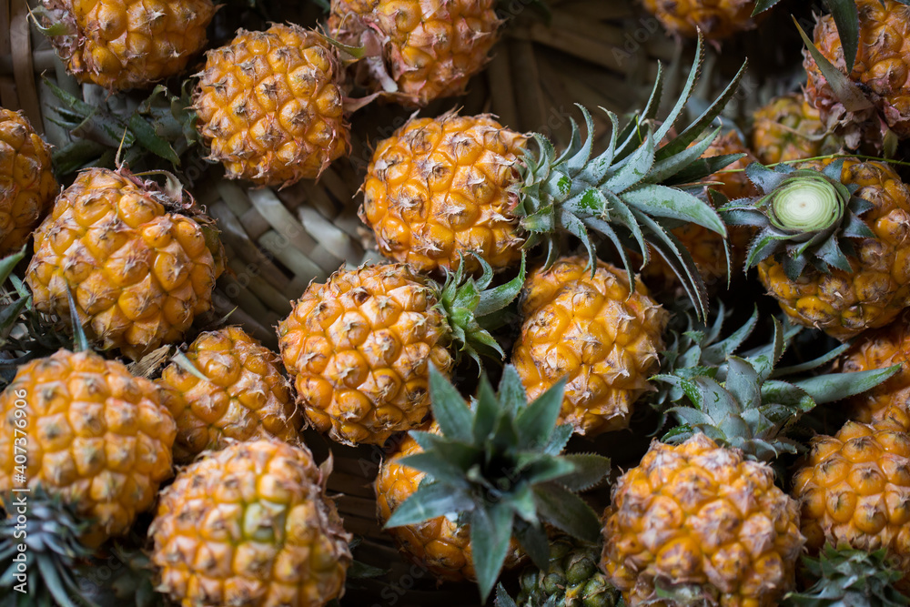 Selling fresh pineapple in the Indian market in Mauritius