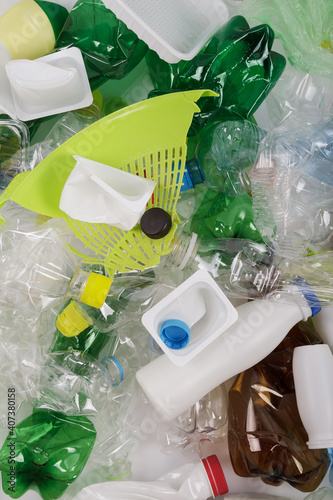 Various plastic waste, bottles, pet, eggplants, plastic cups and household items