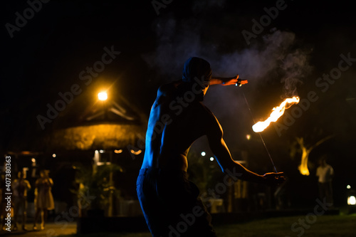 Firestarter performing amazing fire show © Artem Zakharov