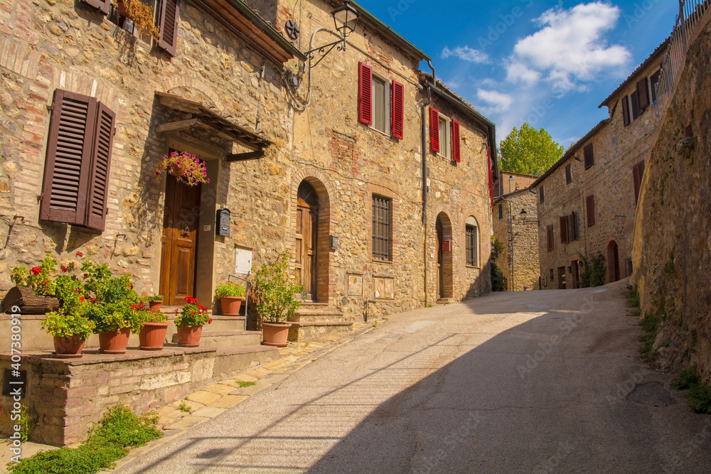 Historic residential buildings in the medieval village of San Lorenzo a Merse near Monticiano in Siena Province, Tuscany, Italy
