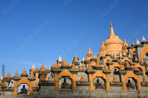 Stunning Sandstone Pagoda in Wat Prachakhom Wanaram (Wat Phakoong or Wat Pa Kung) at Roi Et of Thailand photo