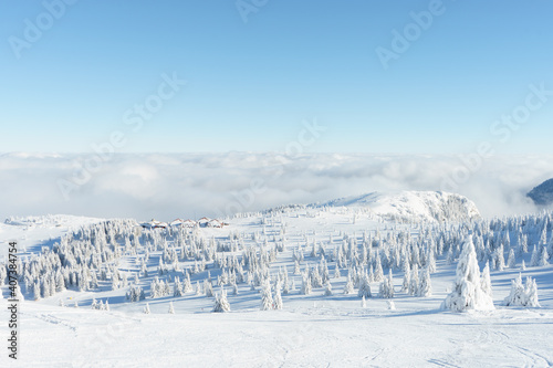 Winter mountain landscape. Beautiful panoramic view. Blue sky and clouds. High quality photo