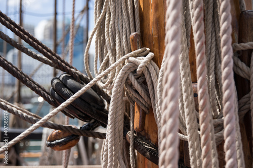 Rope on rigged boat at a dock photo