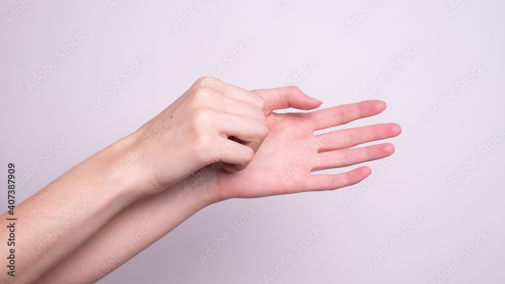 Parkinson's disease symptoms. Close up of tremor (shaking) hands of Middle-aged women patient with Parkinson's disease. Mental health and neurological disorders.