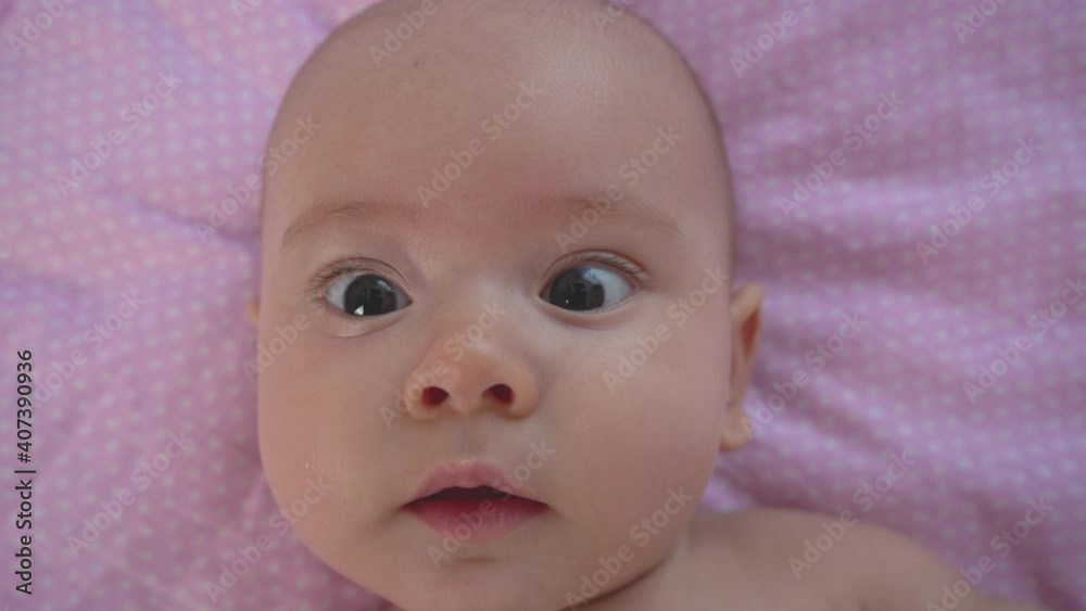 Portrait of a happy newborn baby close up Portrait of a happy newborn baby close up