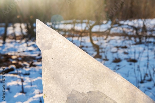 .Close-up pieces of ice texture on the forest in winter time at Bucharest.. photo