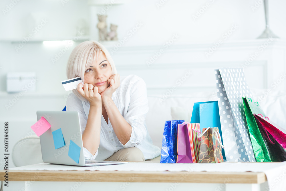 Mature woman doing online shopping Mature woman doing online shopping