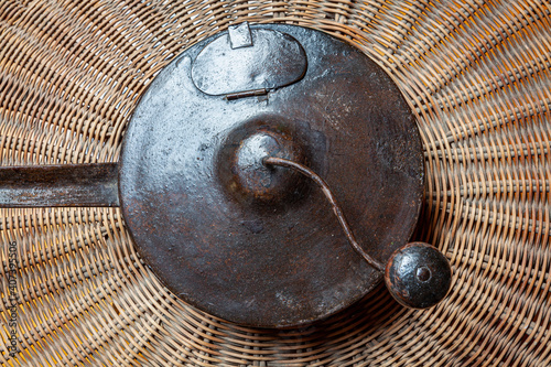 Old pot for roasting coffee, barley or cereals. photo