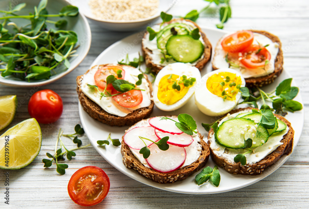 Sandwiches with healthy vegetables and micro greens Sandwiches with healthy vegetables and micro greens