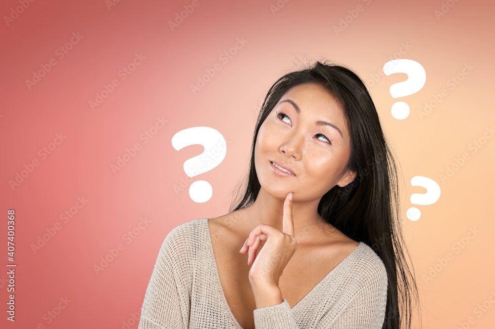 Question sign with a beautiful alarmed woman on pastel background Question sign with a beautiful alarmed woman on pastel background