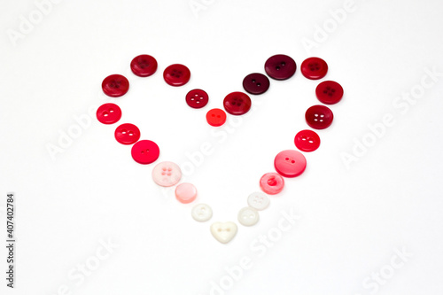 Poster Heart frame from buttons on white background. Valentines day craft. Romantic design.