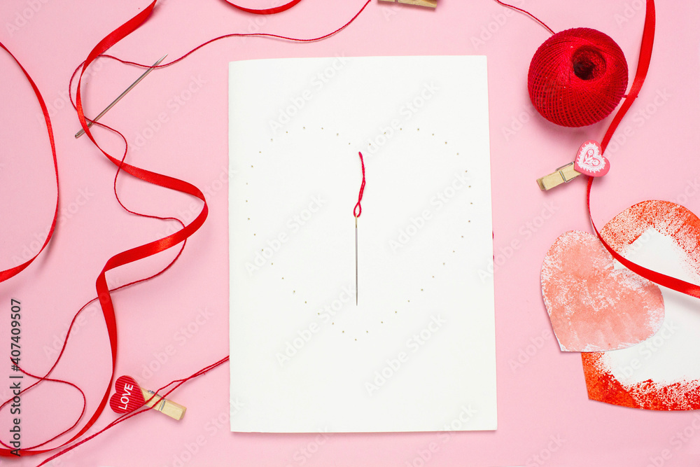 step 3 DIY red thread card on white cardboard, concept of valentine's day, mother's day