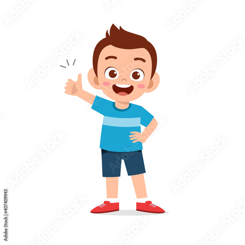 little boy show agreement with thumb up hand gesture