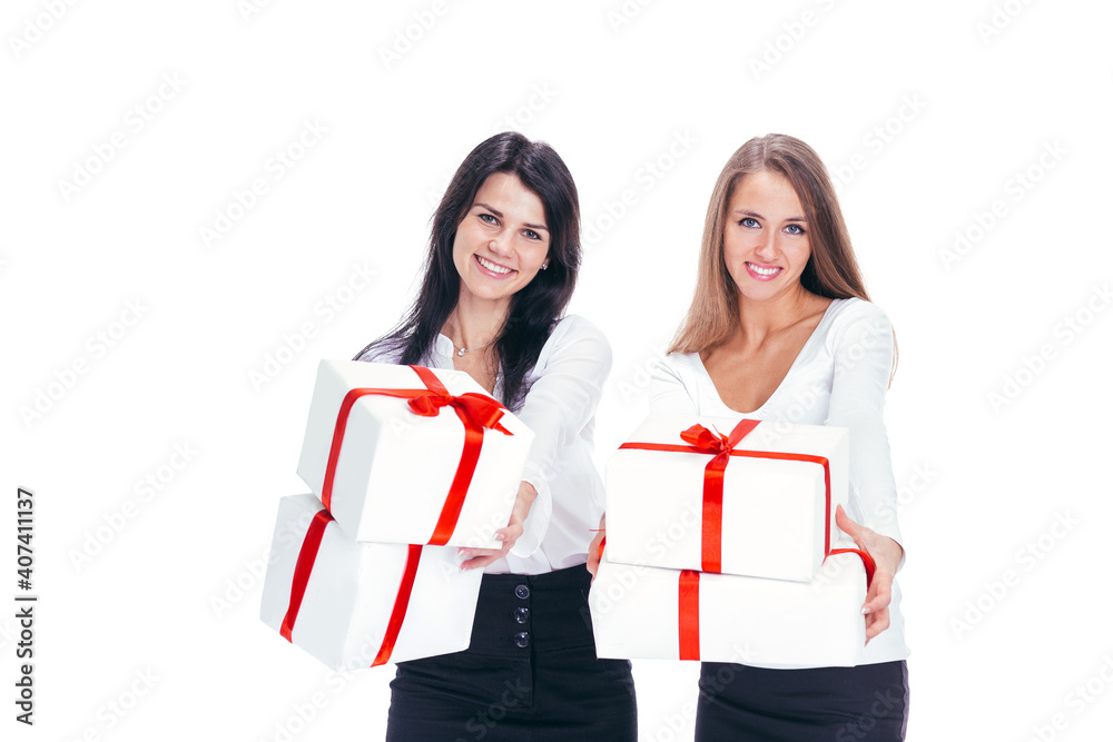 two young women with gift boxes. isolated on white two young women with gift boxes. isolated on white