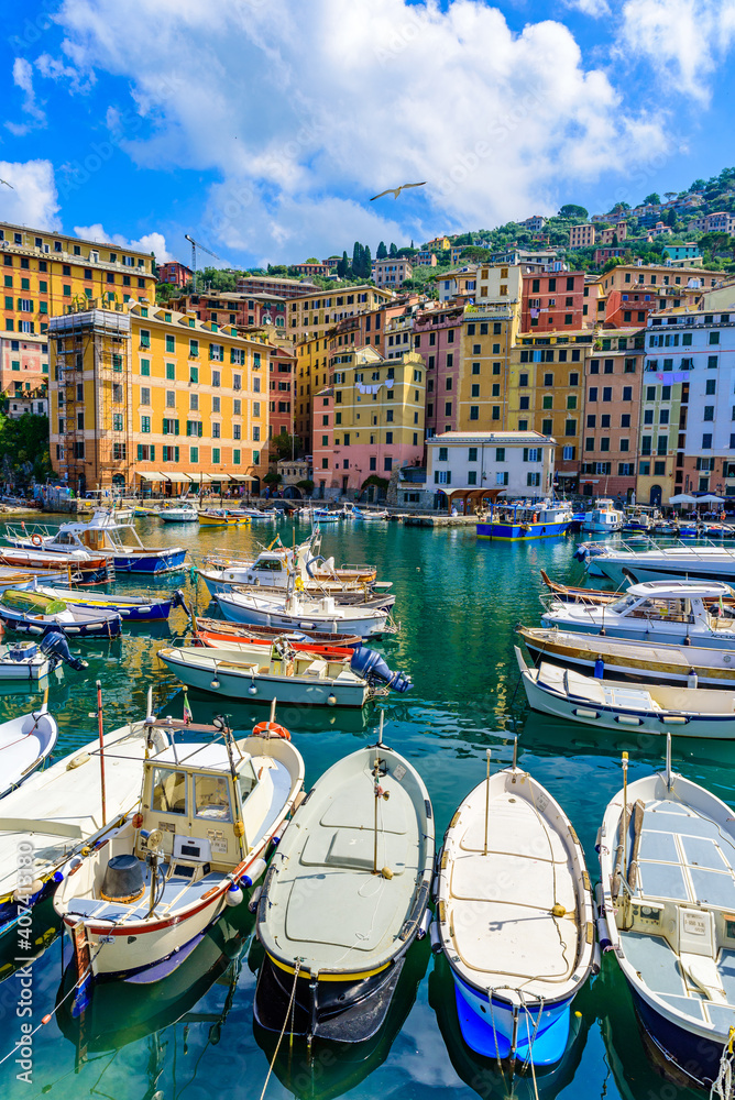 Camogli town in Liguria, Italy. Scenic Mediterranean riviera coast. Historical Old Town Camogli with colorful houses and sand beach at beautiful coast of Italy.