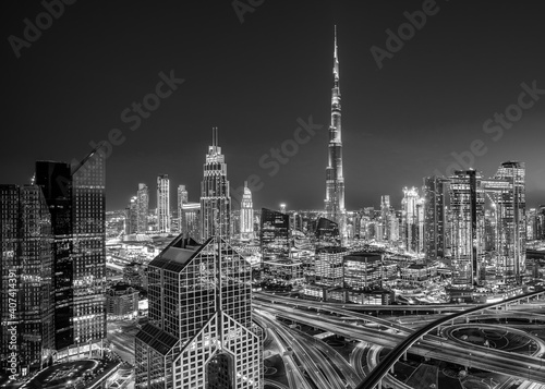 Obraz na płótnie Modern Dubai city skyline at the sunset and beautiful city center, Dubai, United Arab Emirates w salonie