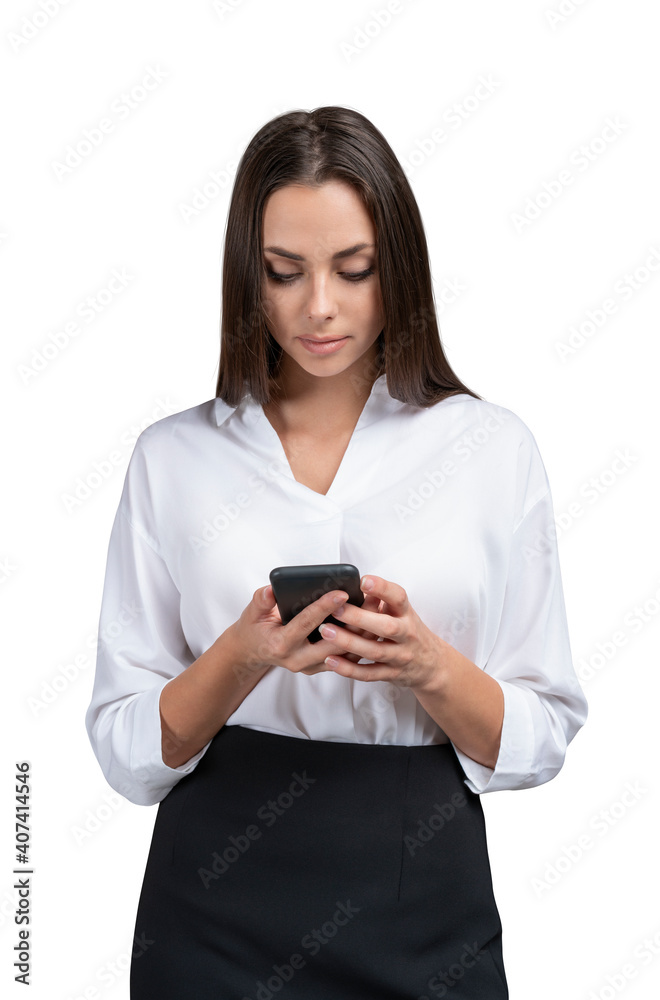 Young businesswoman in white shirt and black skirt with phone in hands. Female office manager isolated over white background looking at the phone screen