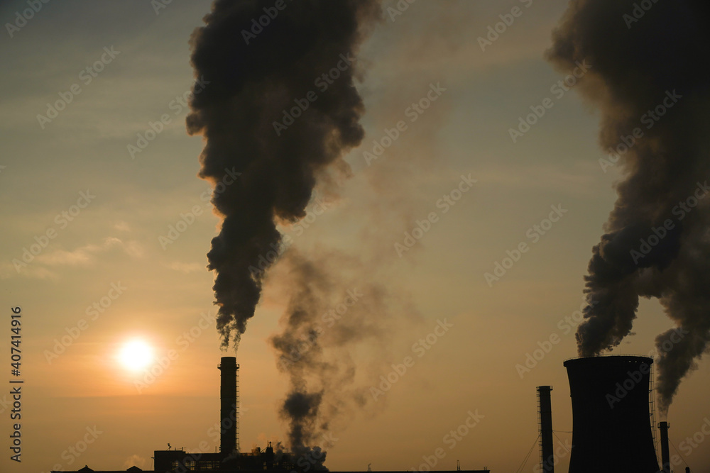 The chimney of a thermal power plant, the smoke extracted by a thermal power plant on the chimney, in the production process. Environment. Pollution.