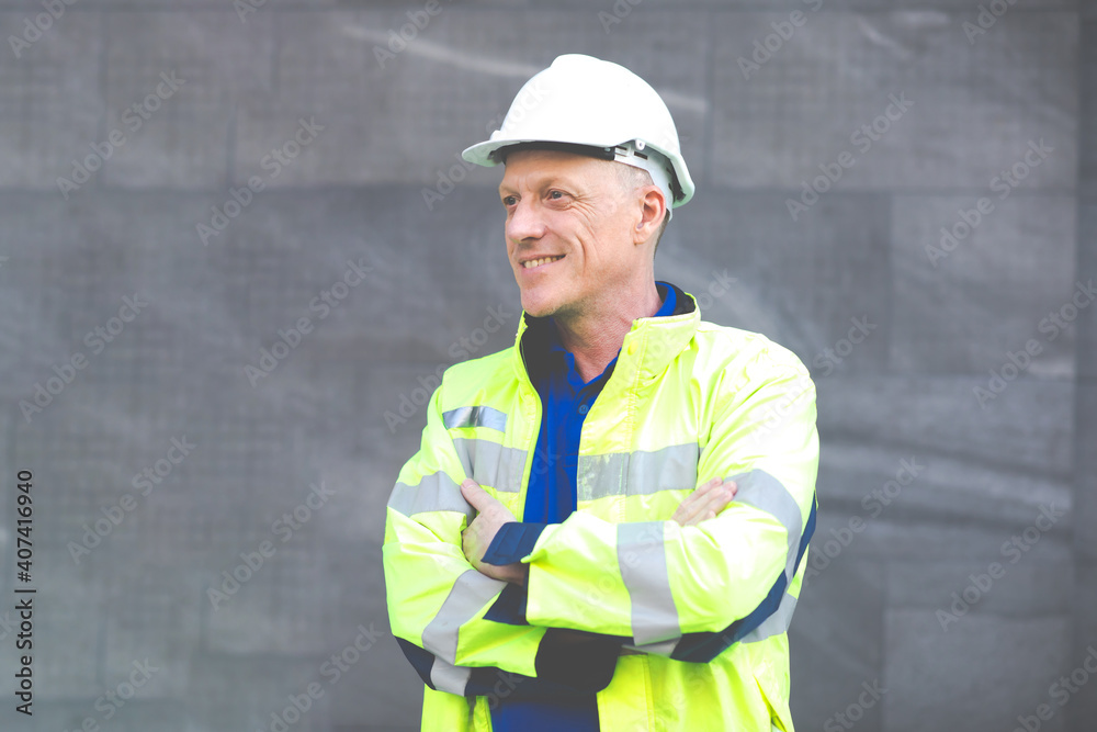 Portrait of Technician Electrical Engineer at rooftop building. Clean and green alternative energy concept. Portrait of Technician Electrical Engineer at rooftop building. Clean and green alternative energy concept.