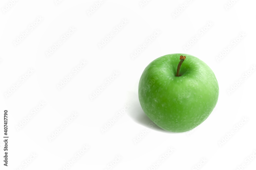 Fresh green apple isolated on white background with space for text. Healthy foods or snack. Fresh green apple isolated on white background with space for text. Healthy foods or snack.