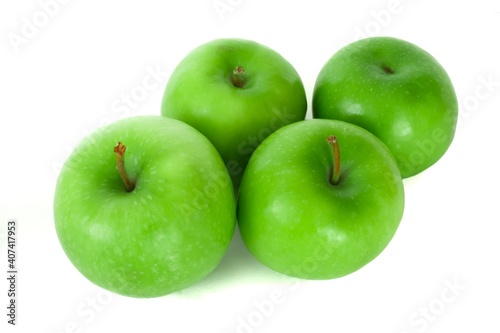 Fresh organic green apples isolated on white background. Healthy foods.