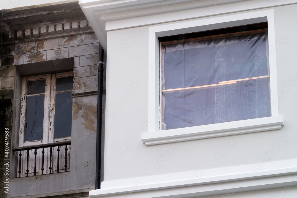 Fototapeta premium senior man farmer picking tomatoes in organic tomato garden