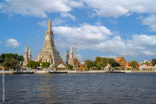 Wat Arun Temple or Wat Arun Ratchawararam Ratchawaramahawihan Along the Chao Phraya River is popular and famous place travel destination in Bangkok Thailand © pomphotothailand