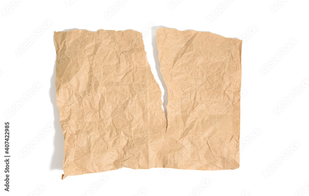 torn piece of brown kraft paper isolated on white background
