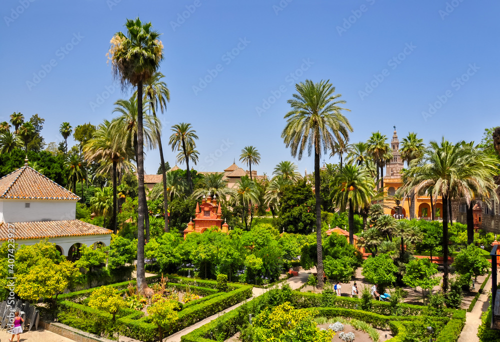 Seville Alcazar gardens landscape in summer, Spain