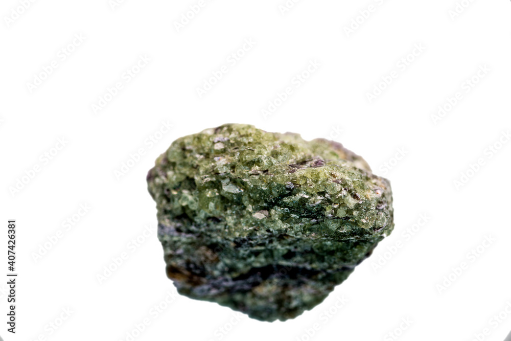 Olivine, closeup of the gemstone cut out on a white background Olivine, closeup of the gemstone cut out on a white background
