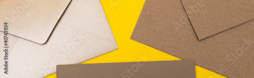 top view of paper envelopes isolated on yellow, banner
