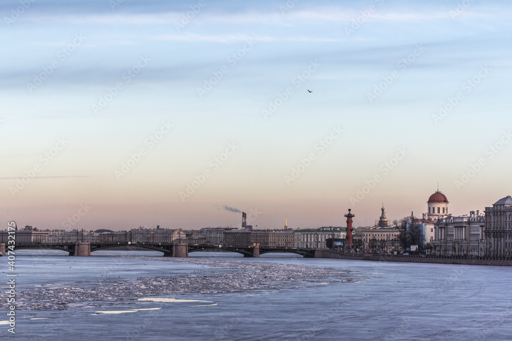 Vasilyevsky Island Arrow, rostral column, Exchange Bridge in St. Petersburg in winter