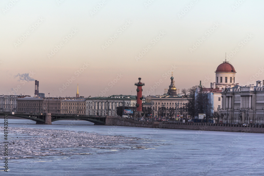 Strelka of Vasilievsky island, Rostral column, Exchange bridge, Makarov Embankment in St. Petersburg in winter