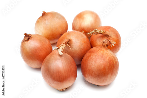 Group of orange onions on white background