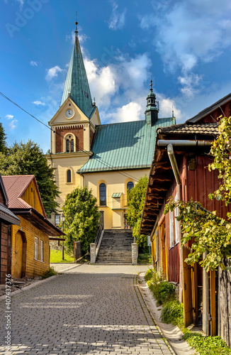 St. John street leading to St. John Baptist Church in historic royal open-air museum town of Lanckorona in mountain region of Lesser Poland