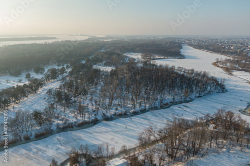 Beautiful winter forest with a drone, near the city