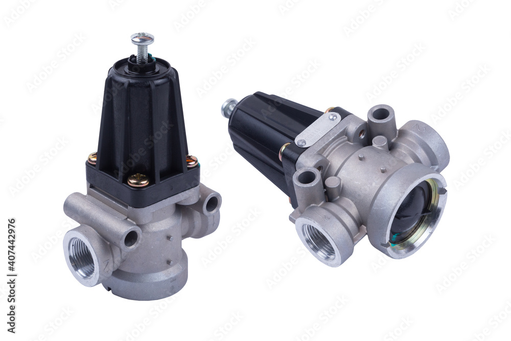 pressure-limiting valve in the brake system of a truck on an isolated white background pressure-limiting valve in the brake system of a truck on an isolated white background