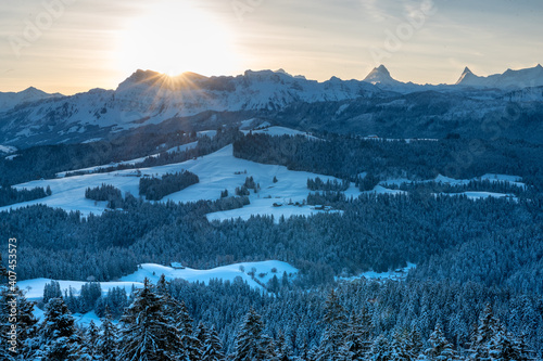 winter sunrise over the hills of Emmental and Bernese Alps © schame87