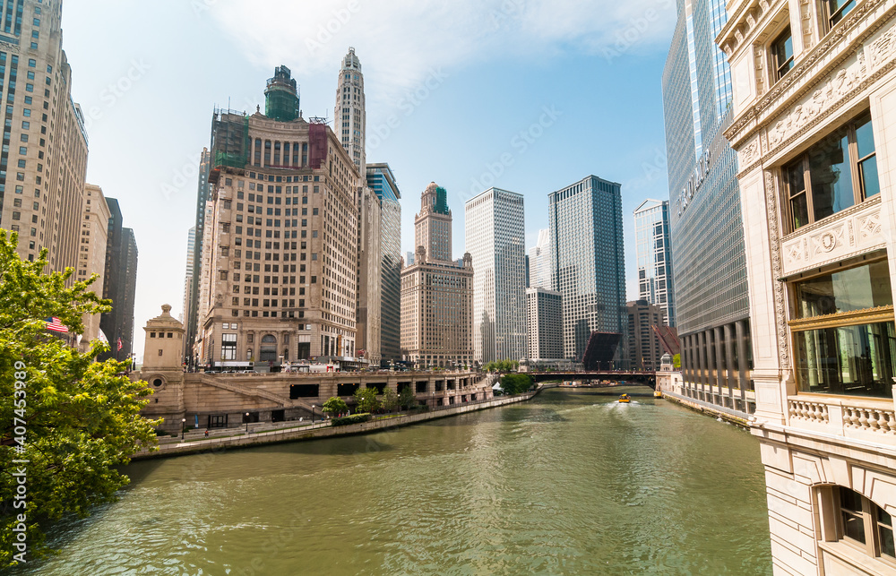View of Chicago River with skyscrapers and riverwalk, USA