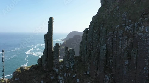 The Giants Causeway lies at the foot of the basalt cliffs along the sea coast on the north shores of County Antrim. It is made up of some 40,000 massive black basalt columns that stick out of the sea.