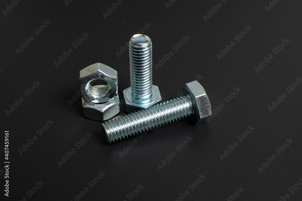 close-up of metal fasteners on black background close-up of metal fasteners on black background