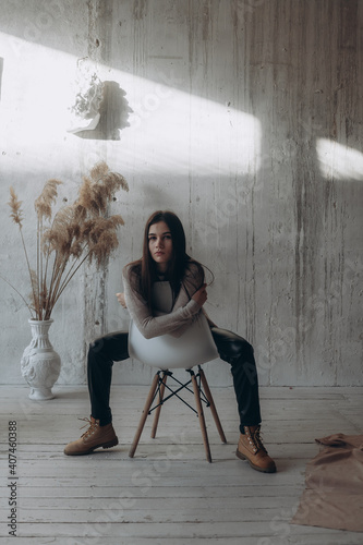 person sitting on a chair