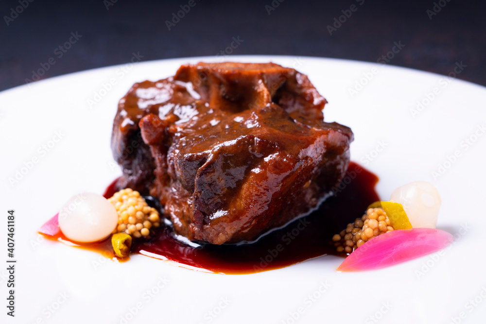 Fine dinning bull's tale dish in a restaurant in Spain.