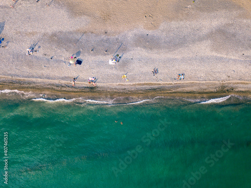 Panorama of a coast as a background from top view. Turquoise water background from top view. Summer seascape from air.  Travel