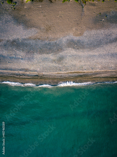 Panorama of a coast as a background from top view. Turquoise water background from top view. Summer seascape from air.  Travel