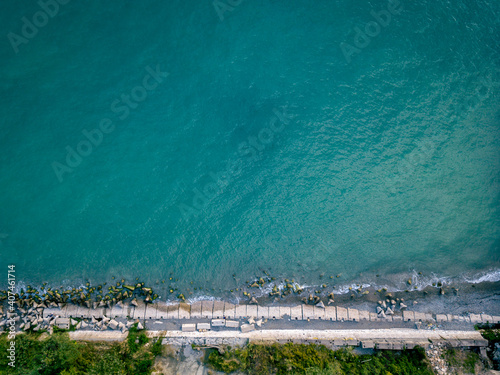 Panorama of a coast as a background from top view. Turquoise water background from top view. Summer seascape from air.  Travel